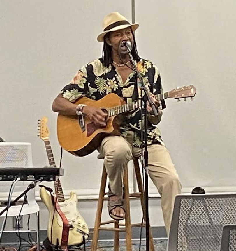Musician Karlus Trapp plays at the Library
