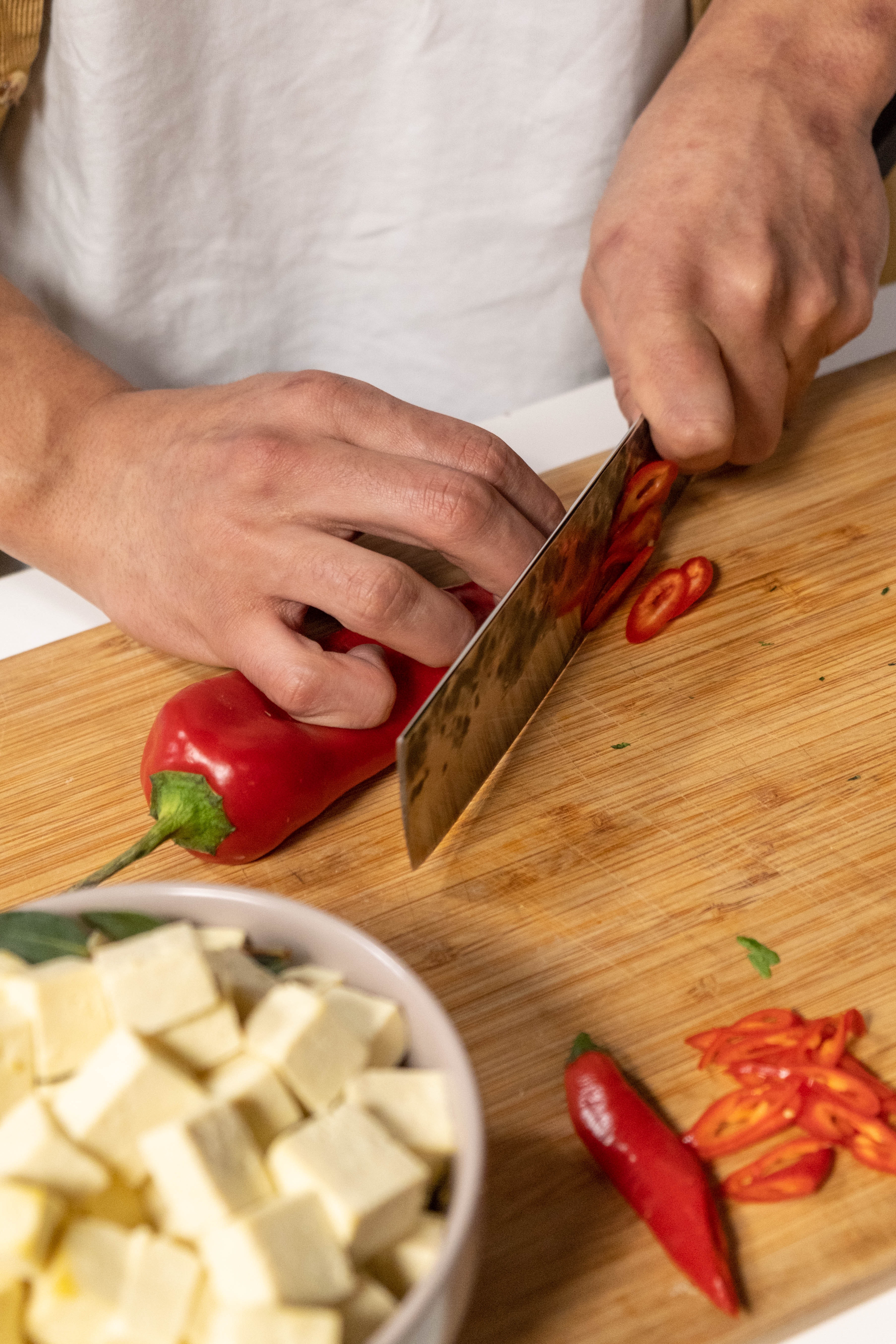 Chopping red bell pepper