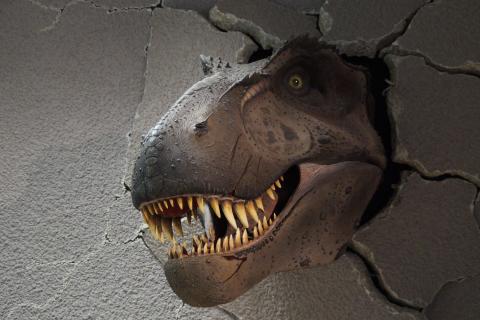 Tyrannosaurus Rex bursts through the wall