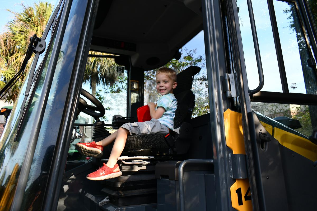 Explore city vehicles in the Library parking lot. 