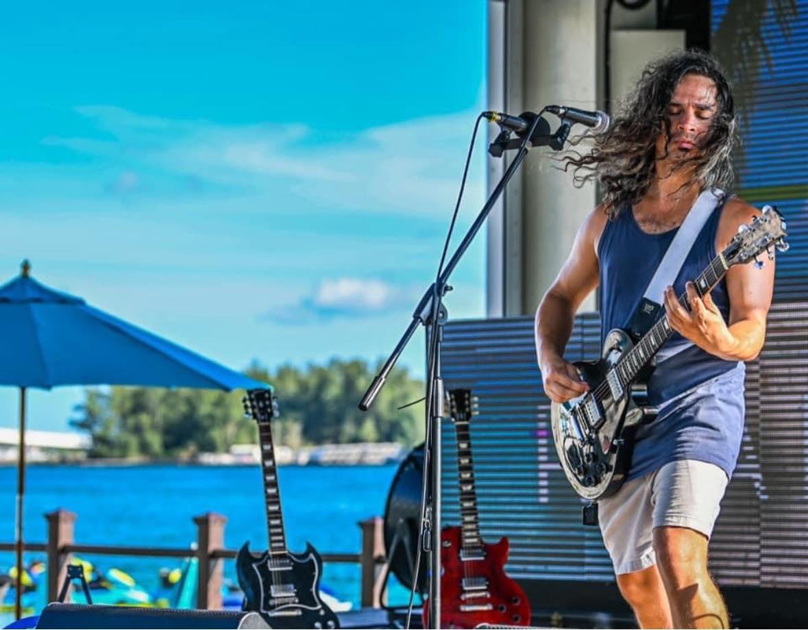Ryan Marchand performing on stage