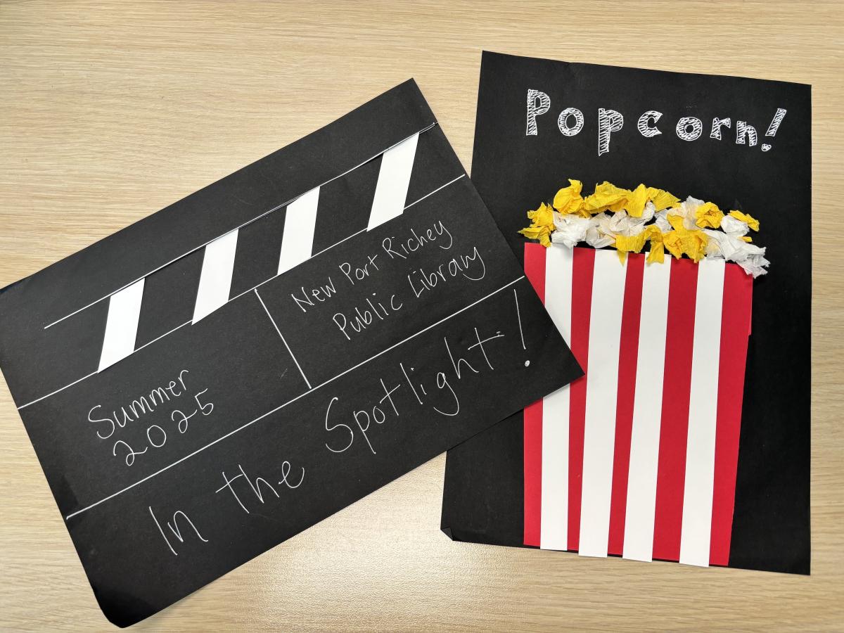 Clapboard and Popcorn Sign